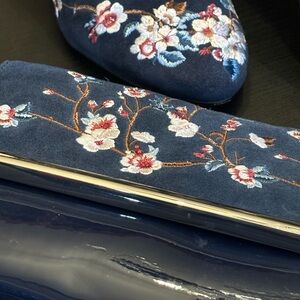 White House Black Market heels & matching clutch.  Navy blue & floral design.